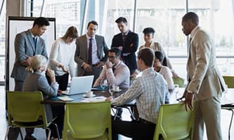 group of people around a meeting table