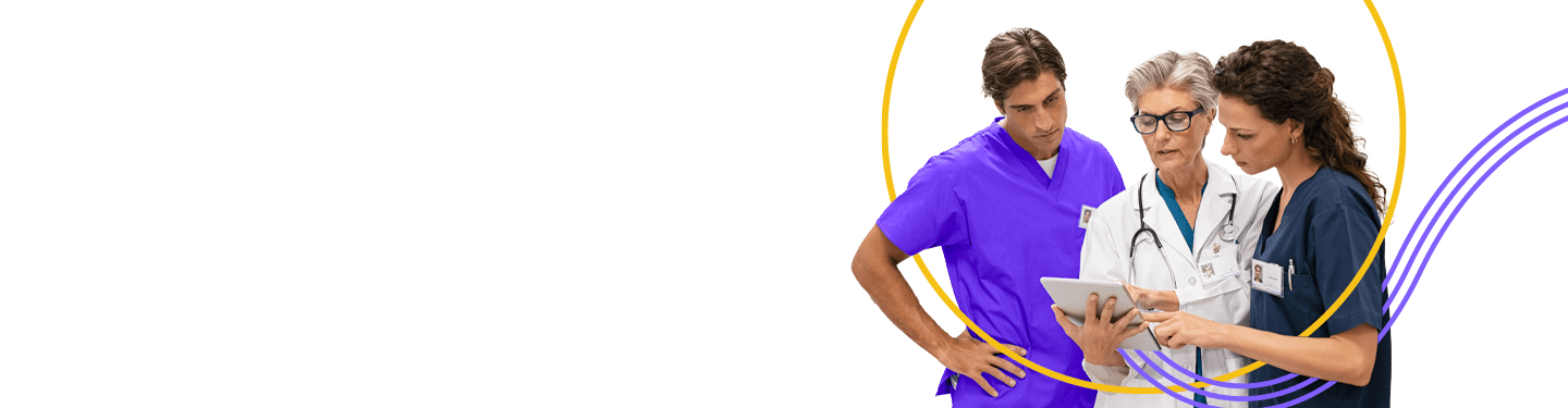 Three doctors working off of a tablet