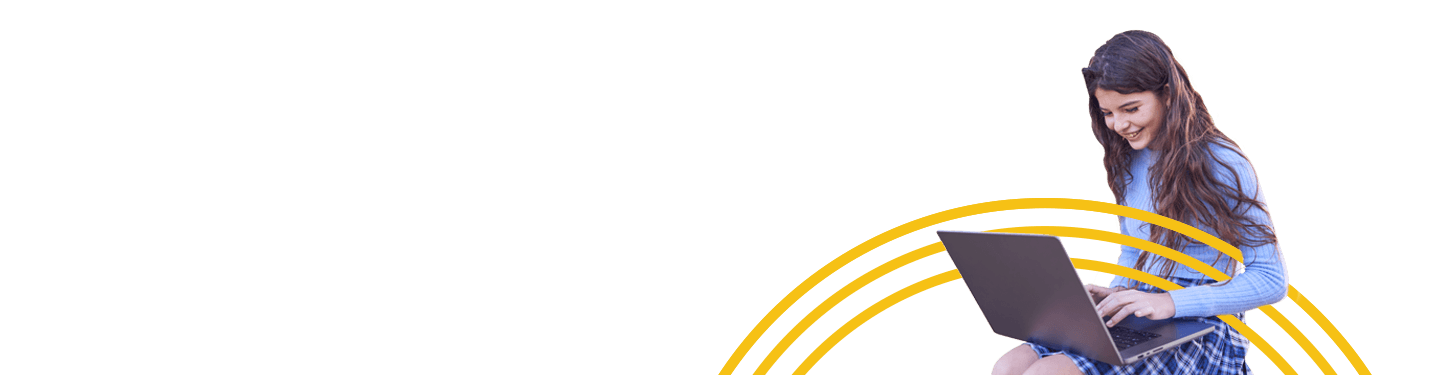 School age girl working on her laptop