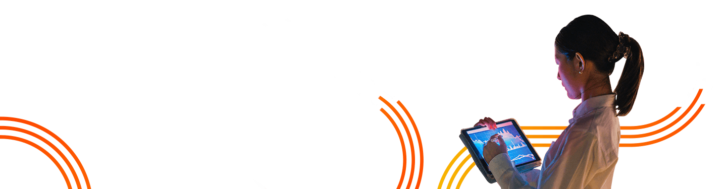 A woman looking at Data analytics & AI solutions on her tablet