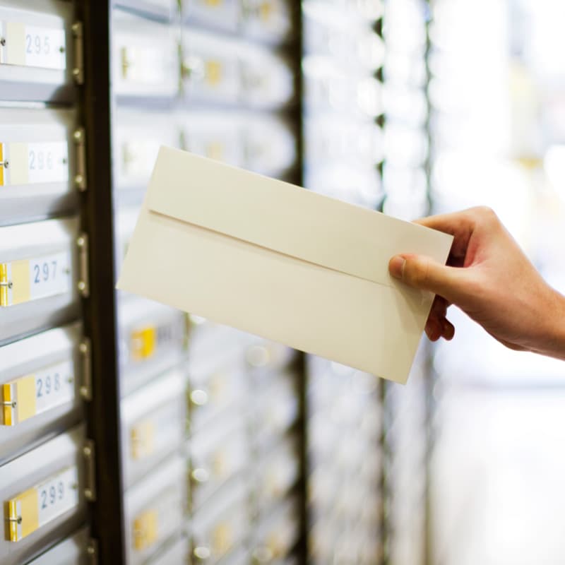 mail going in a mailbox