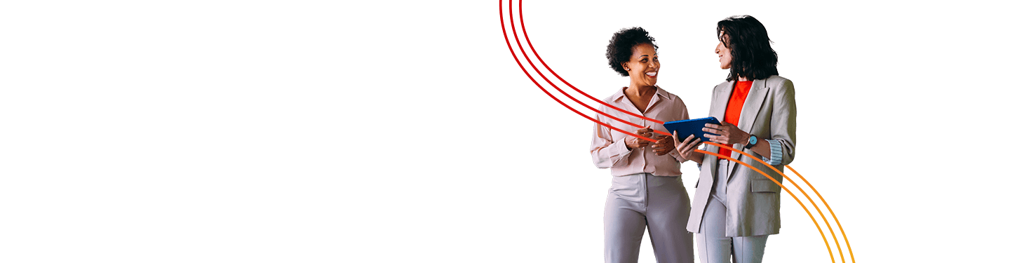 Two women discussing Consulting services for printers & in-plants